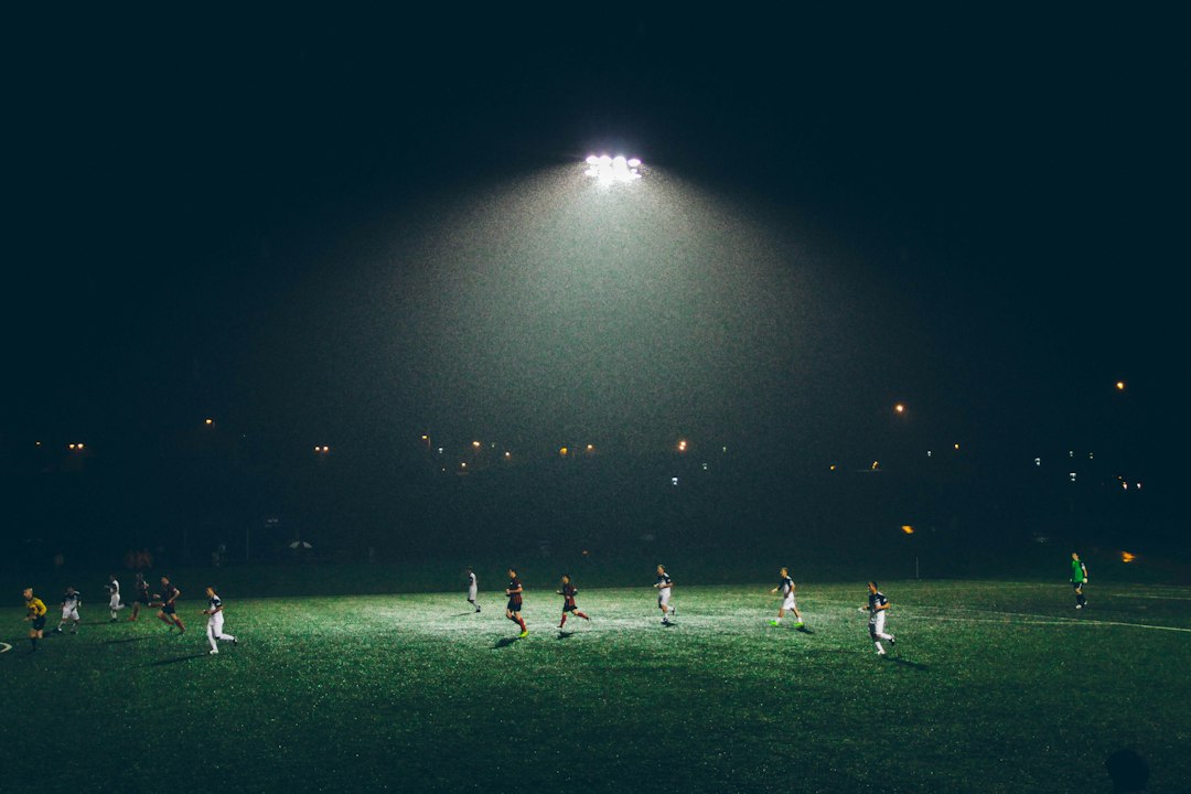 Stadium lights at a Friday night football game